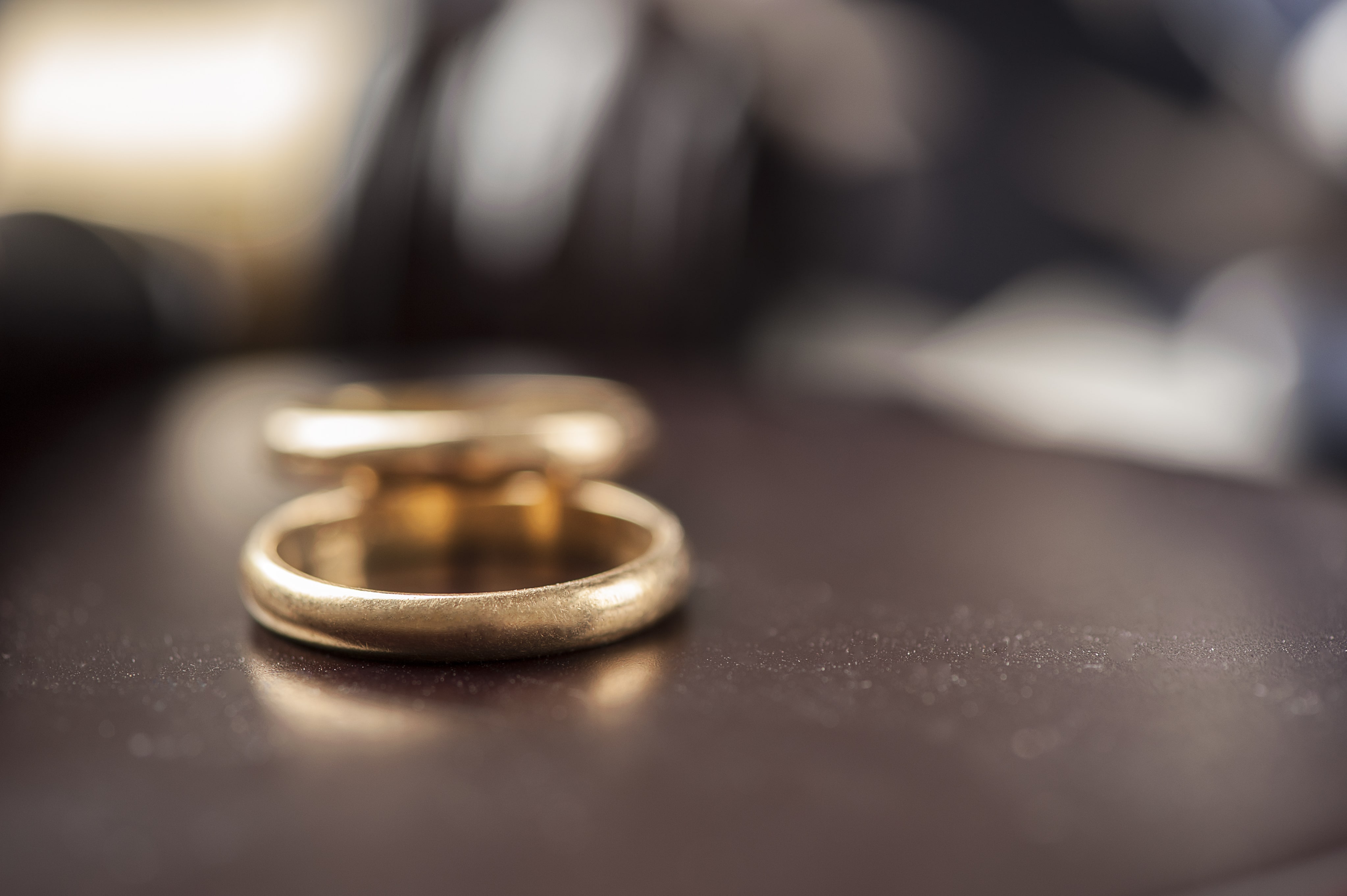 Two gold rings on a table symbolizing divorce lawyer in Orlando